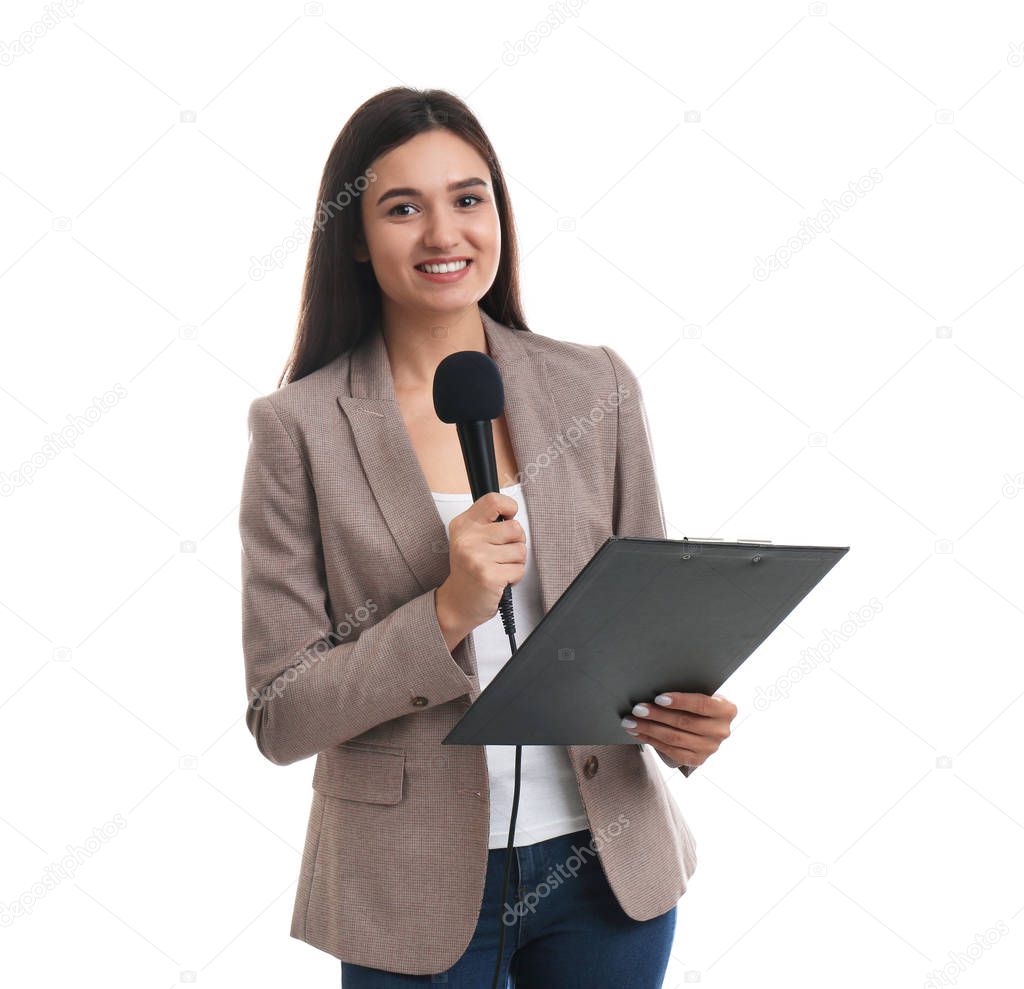 Young female journalist with microphone and clipboard on white b