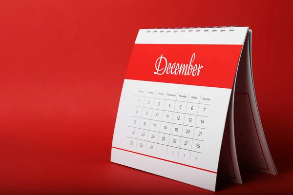 Paper calendar on red background, space for text. Planning conce — Stock Photo, Image