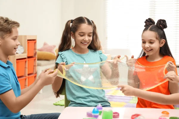 Happy Children Playing Slime Table Indoors — Stock Photo, Image