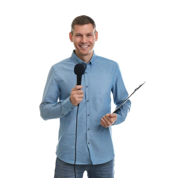 Male journalist with microphone and clipboard on white backgroun — Stock Photo, Image