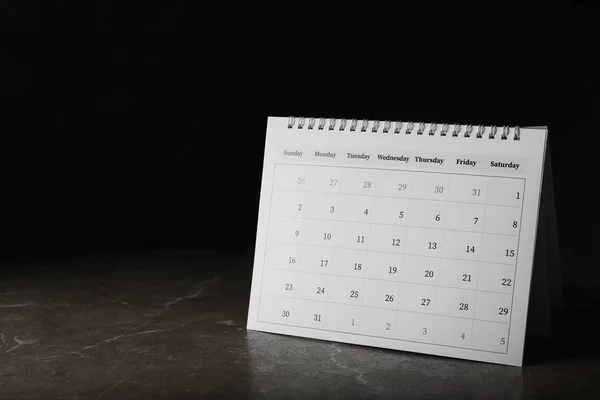 Calendrier en papier sur table en pierre, espace pour le texte. Concept de planification — Photo