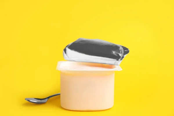 Tasty Organic Yogurt Plastic Cup Yellow Background — ストック写真