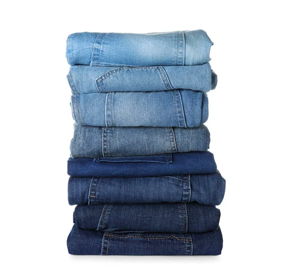 Stack olika jeans isolerad på vit — Stockfoto