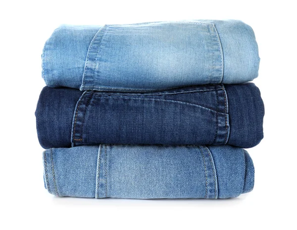 Stack olika jeans isolerad på vit — Stockfoto