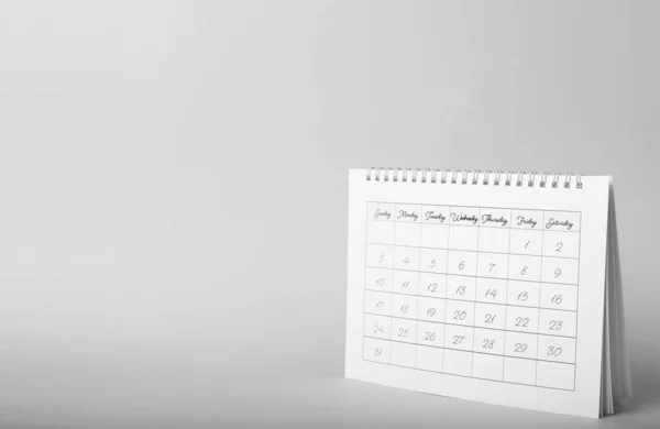 Calendrier papier sur fond gris, espace pour le texte. Conc de planification — Photo