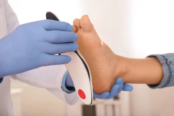 Male Orthopedist Fitting Insole Patient Foot Clinic Closeup — Stock Photo, Image