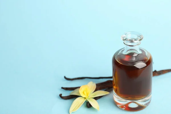 Aromatic Homemade Vanilla Extract Light Blue Background Space Text — Stock Photo, Image