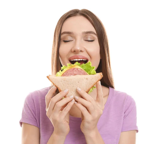 Jovem Mulher Comendo Saboroso Sanduíche Fundo Branco — Fotografia de Stock