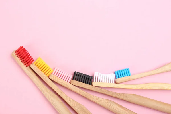 Toothbrushes Made Bamboo Pink Background Flat Lay Space Text — Stock Photo, Image