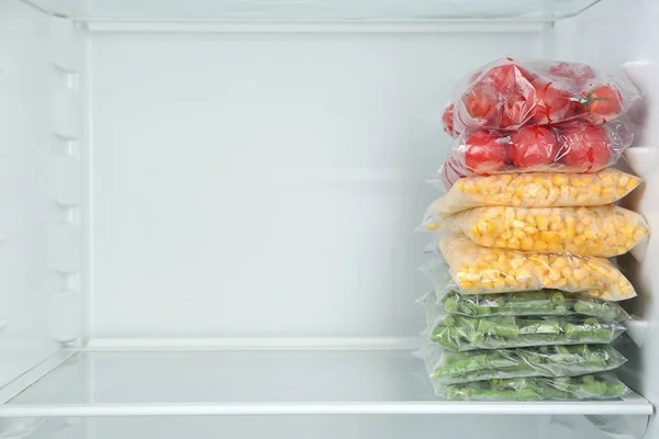 Plastic Bags Different Frozen Vegetables Refrigerator — Stock Photo, Image