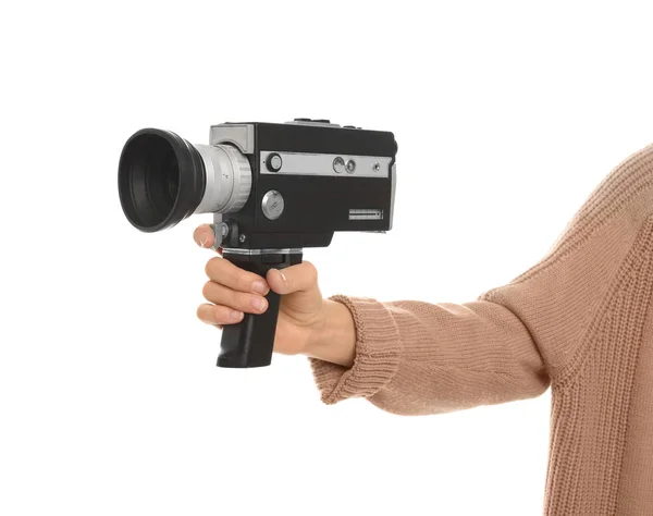 Vrouw met vintage videocamera op witte achtergrond, close-up van — Stockfoto