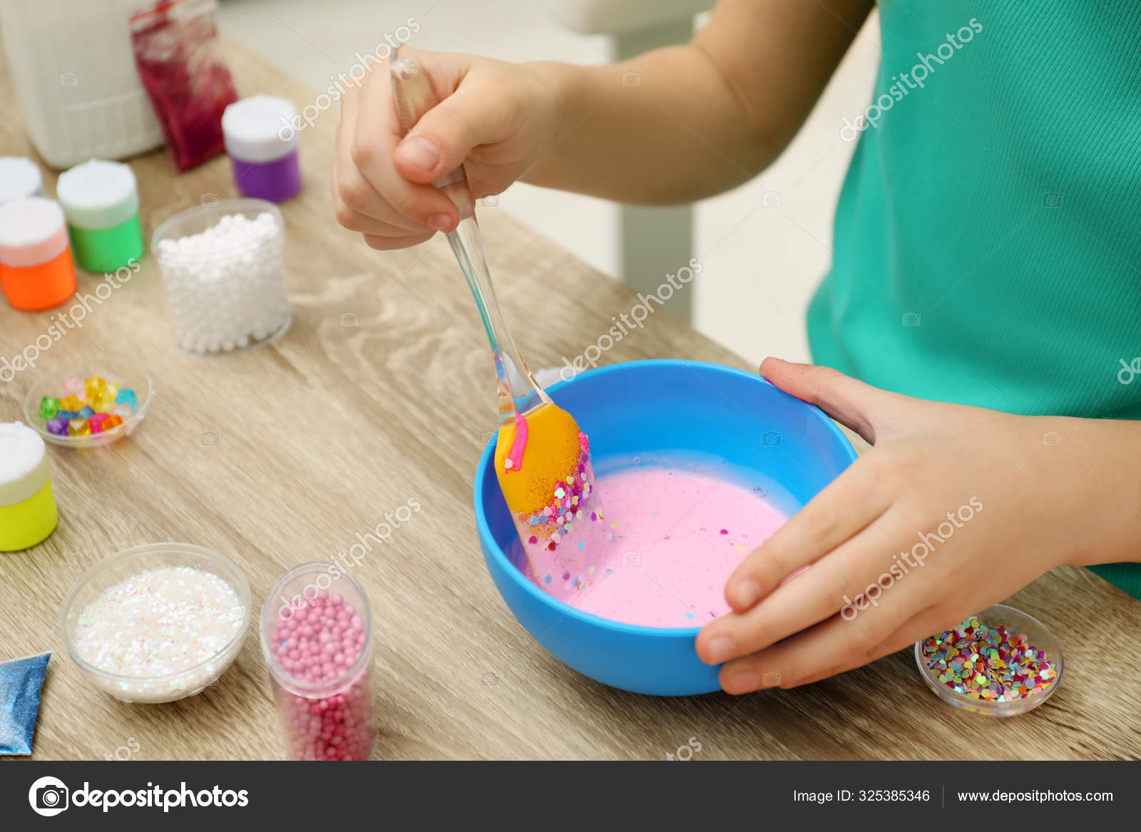 Little Girl Mixing Ingredients Silicone Spatula Table Closeup Diy Slime Stock Photo by