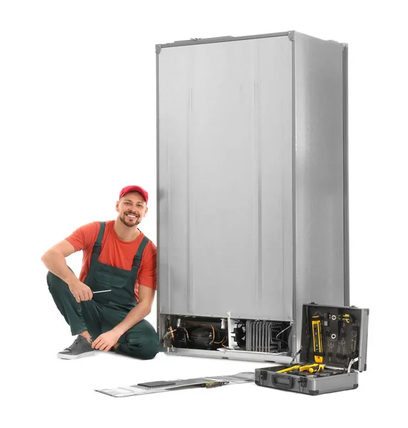 Male Technician Repairing Refrigerator White Background — Stock Photo, Image