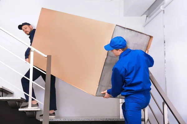 Professional Workers Carrying Refrigerator Stairs Indoors — Stock Photo, Image