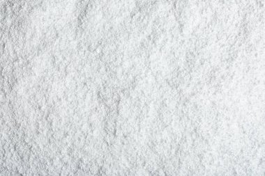 Arkaplan olarak beyaz kar yığını, üst görünüm