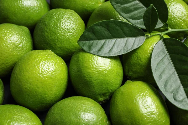 Färska Mogna Gröna Lime Som Bakgrund Närbild — Stockfoto
