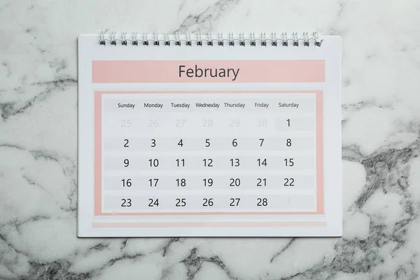 Februari Kalender Marmeren Achtergrond Bovenaanzicht — Stockfoto