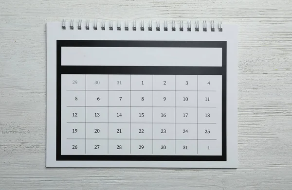 Papírový Kalendář Bílém Dřevěném Pozadí Horní Pohled — Stock fotografie
