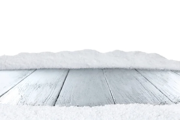 白色背景下灰色木制表面上的大雪 — 图库照片
