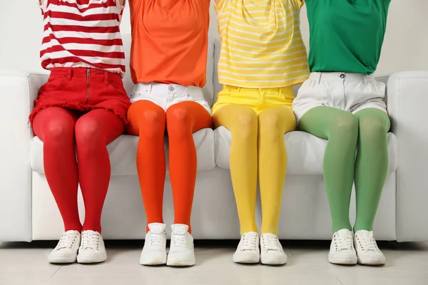 Women Wearing Bright Tights Sitting Sofa Indoors Closeup — Stock Photo, Image