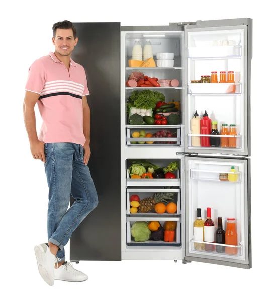 Человек Рядом Открытым Холодильником Белом Фоне — стоковое фото