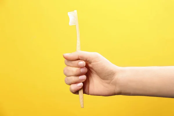 Woman Holding Bamboo Toothbrush Yellow Background Closeup — Stock Photo, Image