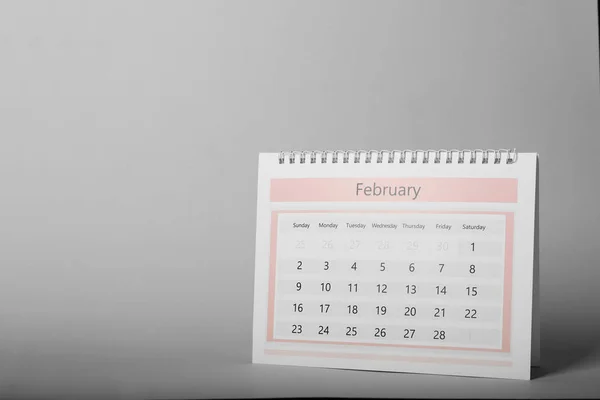 Paper calendar on grey background, space for text. Planning conc — Stock Photo, Image