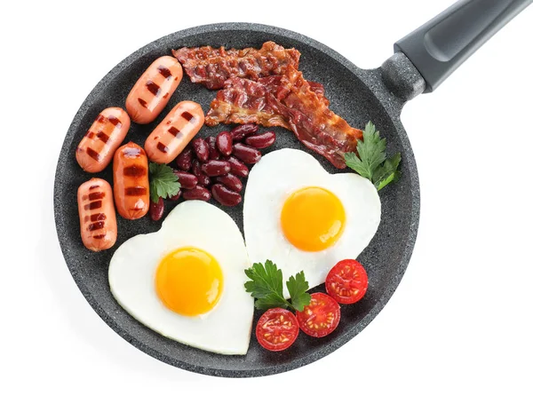 Delicious breakfast with heart shaped eggs and sausages isolated — 图库照片