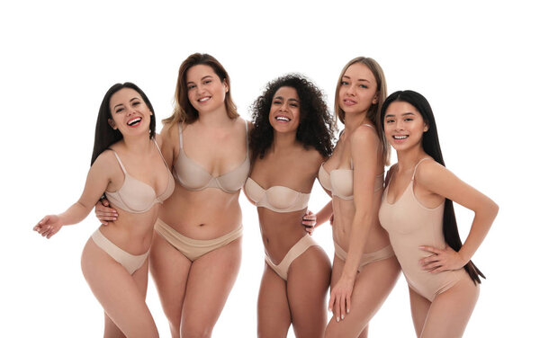 Group of women with different body types in underwear on white background