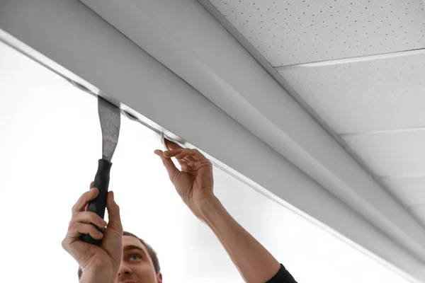 Repairman Installing White Stretch Ceiling Room Closeup Royalty Free Stock Photos