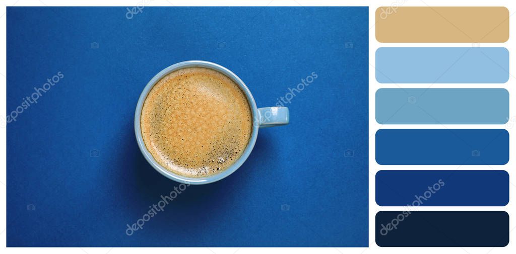 Black coffee on bright background, top view. Color of the year 2020 (Classic blue)