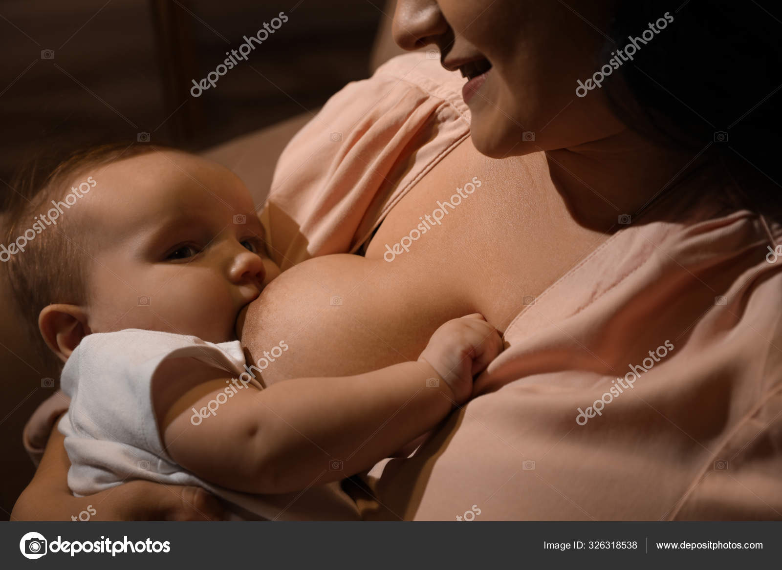 Nudist female breastfeeding