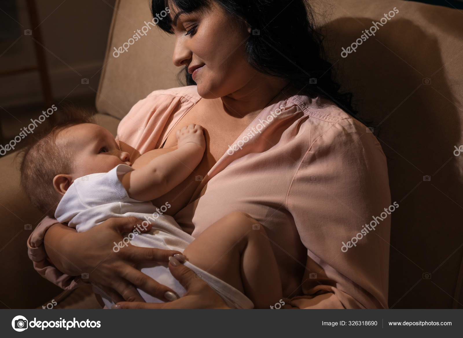 Nudist female breastfeeding