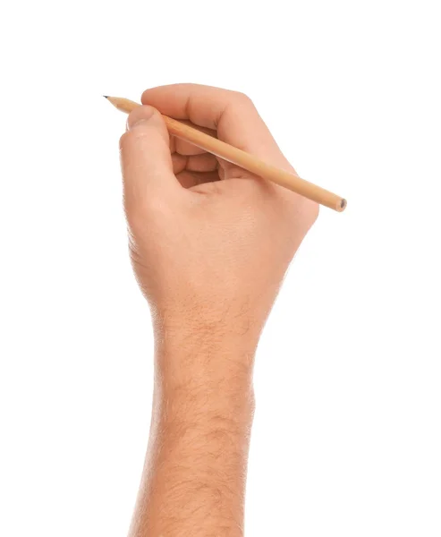 Man som håller vanlig penna på vit bakgrund, närbild — Stockfoto