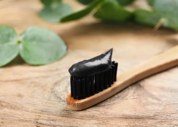 Bamboo Toothbrush Charcoal Paste Wooden Table Closeup Space Text — Stock Photo, Image