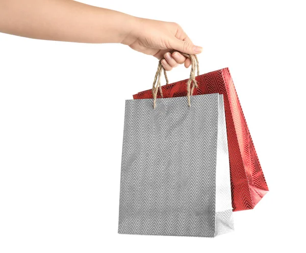 하얀 배경에 종 이 로된 쇼핑백을 들고 있는 여자. — 스톡 사진