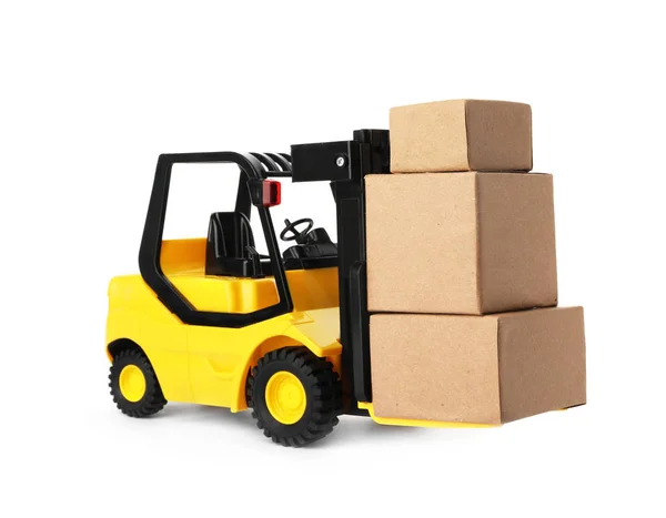 Leksaksgaffeltruck med lådor isolerade på vitt. Logistik och partihandel — Stockfoto