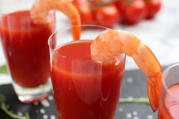 Delicious shrimp cocktail with tomato sauce, closeup