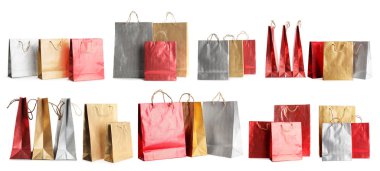 Red paper shopping bags isolated on white clipart