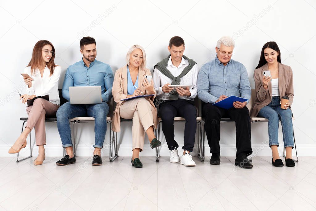 People waiting for job interview in office