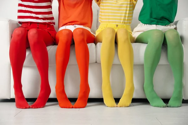 Women Wearing Bright Tights Sitting Sofa Indoors Closeup — Stock Photo, Image