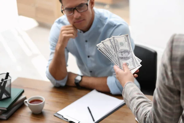 Woman Offering Bribe Money Man Table Closeup — Stock Photo, Image