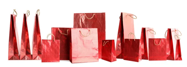 Red paper shopping bags isolated on white — Stock Photo, Image