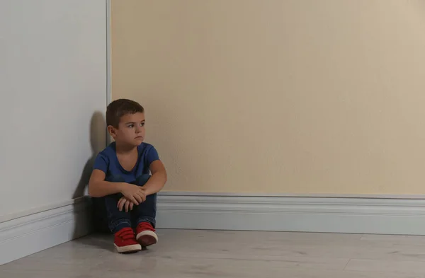Little Boy Sitting Corner Yellow Wall Space Text Child Danger — Stock Photo, Image