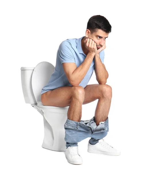 Man Zittend Toiletpot Witte Achtergrond — Stockfoto