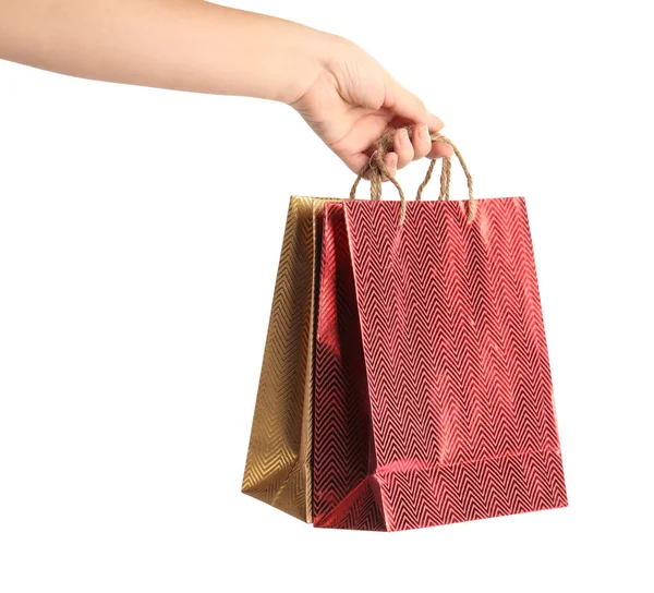 Mujer sosteniendo bolsas de papel sobre fondo blanco, primer plano . —  Fotos de Stock