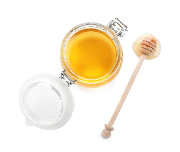 Tarro de miel orgánica y cazo aislado en blanco, vista superior — Foto de Stock