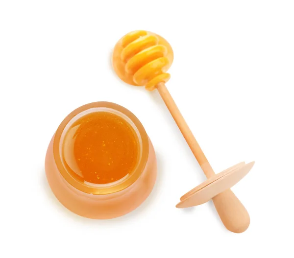 Frasco de mel orgânico e dipper isolado em branco, vista superior — Fotografia de Stock