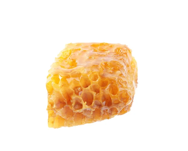 Piece of tasty fresh honeycomb isolated on white — ストック写真