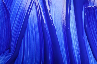 Vuruşları arkaplan olarak boya, üst görünüm olarak. 2020 yılının rengi (Klasik mavi)